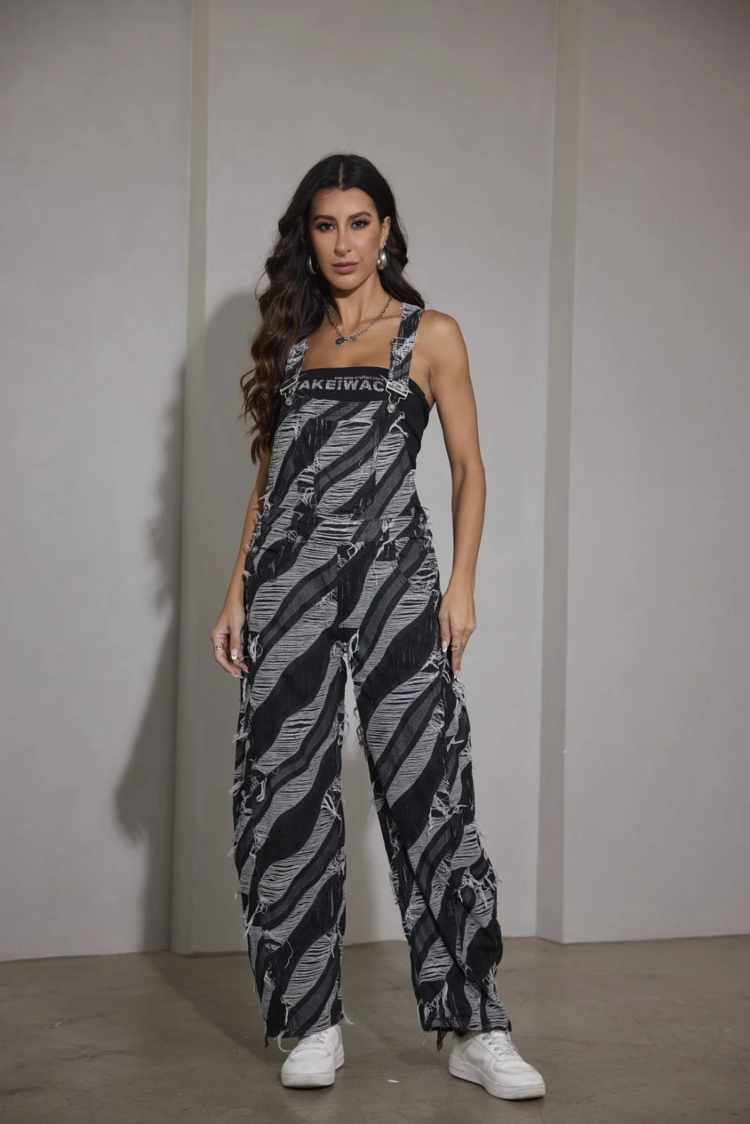 0-02-05-e7feeaa0bb8bf8ef479b08dcdc89cc49435d09445cb7a5d3c8a491bb515df685_22373cd96ee Zebra Denim Jumpsuit - Image 1